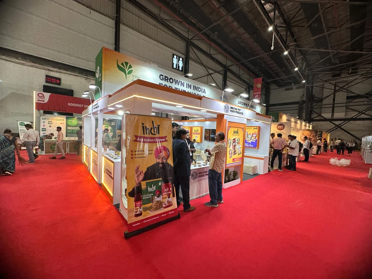 Melting Pot Food team and visitors inside the completed Inchi and Indi exhibition stall at Anuga Select India
